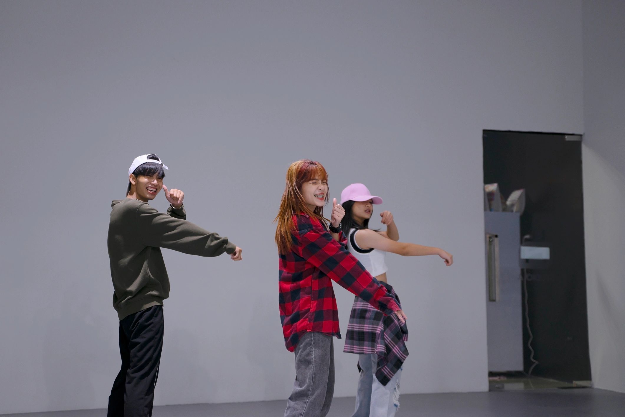 Teen students learning dance in a studio